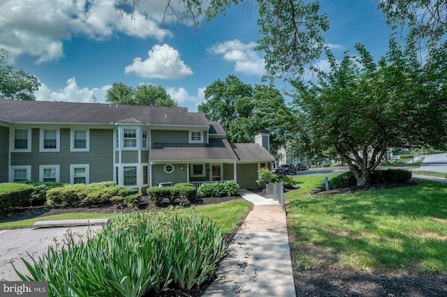 722 Scotch Way Unit C-26, West Chester, PA 19382 - view of front of property with a porch, a chimney, and a front yard