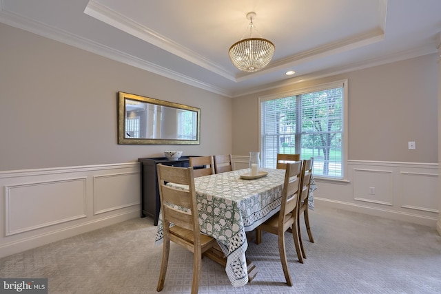 2149 Colleens Way, Lancaster, PA 17601 - dining room with a tray ceiling, a decorative wall, crown molding, a chandelier, and light carpet