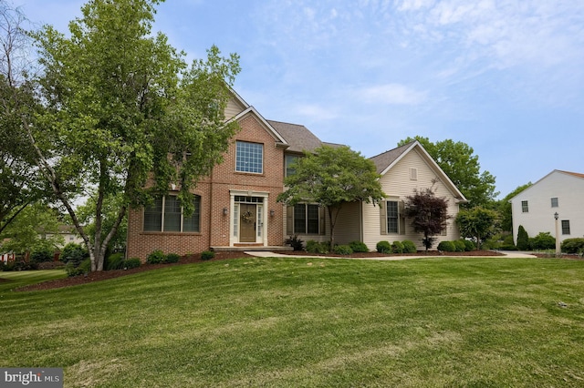2149 Colleens Way, Lancaster, PA 17601 - traditional-style house with brick siding and a front lawn