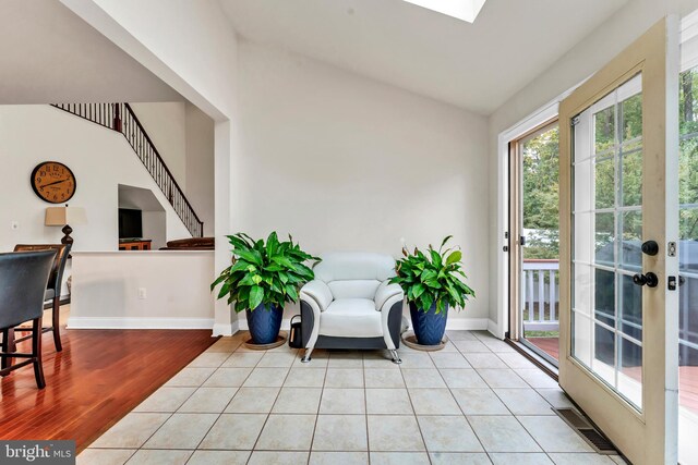 3913 Rolling Paddock Dr, Upper Marlboro, MD 20772 - sitting room with vaulted ceiling, baseboards, and tile patterned flooring