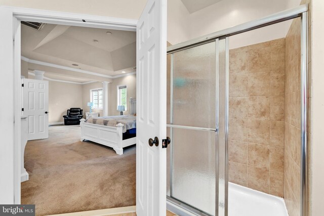 3913 Rolling Paddock Dr, Upper Marlboro, MD 20772 - full bath featuring connected bathroom, a shower stall, ornate columns, a tray ceiling, and crown molding