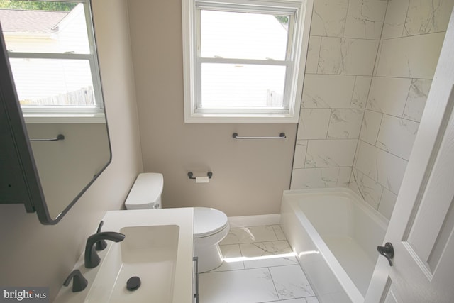 180 Carroll Rd, Pasadena, MD 21122 - bathroom with marble look tile flooring, toilet, baseboards, vanity, and bathtub / shower combination