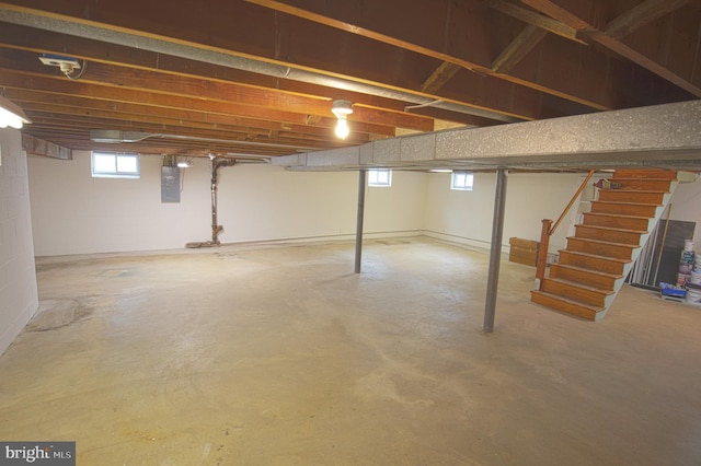 180 Carroll Rd, Pasadena, MD 21122 - basement with stairway, electric panel, and plenty of natural light