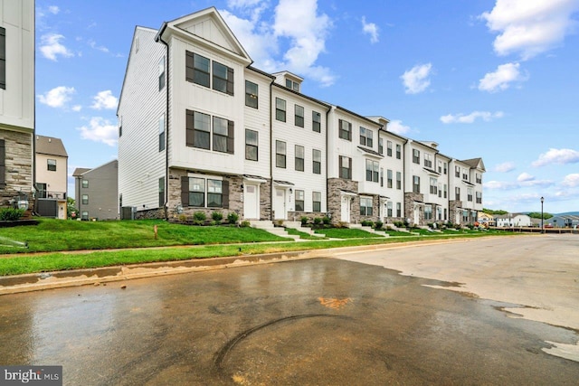 7417 Calm Retreat Blvd, Brandywine, MD 20613 - view of building exterior with a residential view and cooling unit