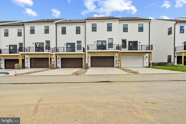 7417 Calm Retreat Blvd, Brandywine, MD 20613 - view of front of home with driveway, an attached garage, and central AC