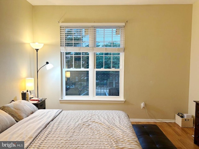 1581 Spring Gate Dr Unit 5207, Mclean, VA 22102 - bedroom featuring wood finished floors and baseboards