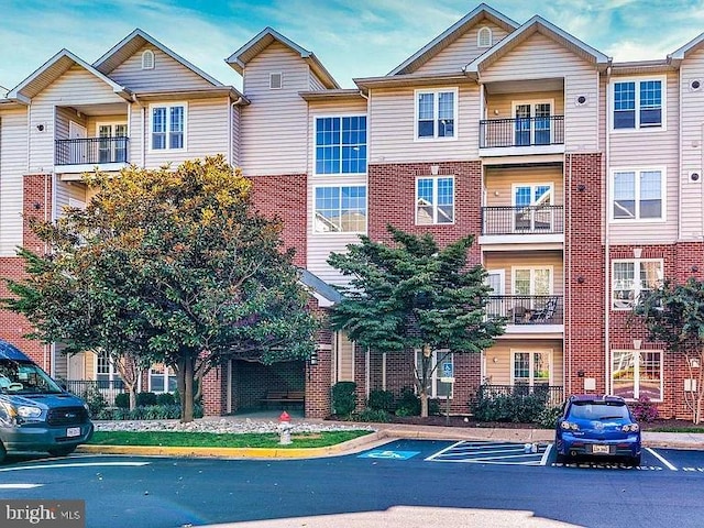 1581 Spring Gate Dr Unit 5207, Mclean, VA 22102 - view of property with uncovered parking