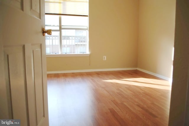 1581 Spring Gate Dr Unit 5207, Mclean, VA 22102 - spare room featuring wood finished floors and baseboards