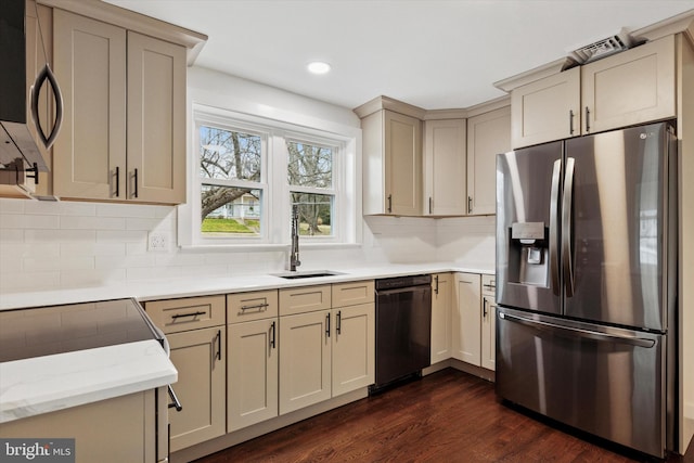 1631 Old Schuylkill Rd, Spring City, PA 19475 - kitchen featuring appliances with stainless steel finishes, dark wood-style floors, decorative backsplash, light stone countertops, and recessed lighting