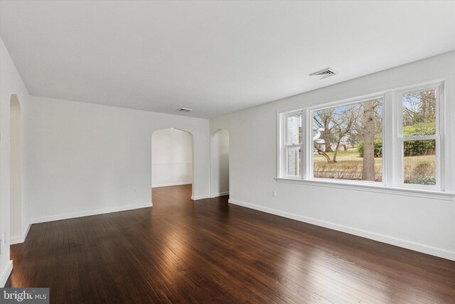 1631 Old Schuylkill Rd, Spring City, PA 19475 - spare room featuring arched walkways and wood finished floors