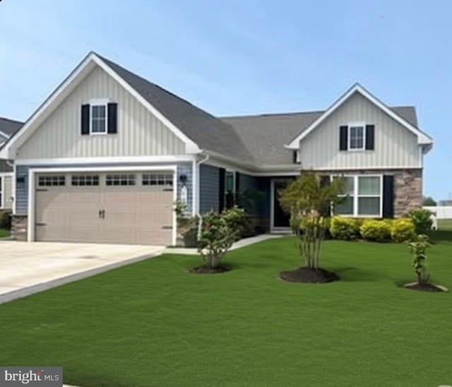 7643 Central Parke Blvd, Milford, DE 19963 - craftsman inspired home with board and batten siding, driveway, a front yard, and stone siding