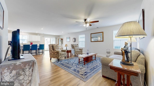 7643 Central Parke Blvd, Milford, DE 19963 - living area with a ceiling fan, light wood finished floors, recessed lighting, and baseboards