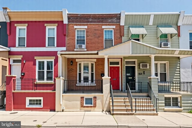 1523 N Hollywood St, Philadelphia, PA 19121 - townhome / multi-family property featuring a porch and brick siding