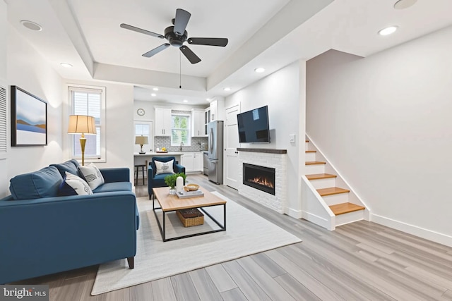 1523 N Hollywood St, Philadelphia, PA 19121 - living area with a ceiling fan, light wood-style floors, a fireplace, baseboards, and recessed lighting