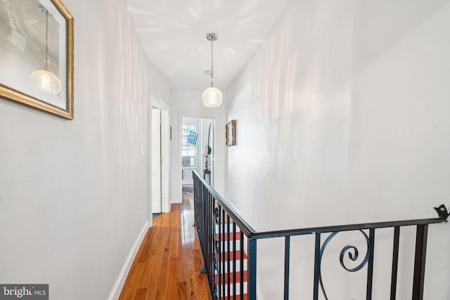 1523 N Hollywood St, Philadelphia, PA 19121 - hall with an upstairs landing, baseboards, and wood finished floors