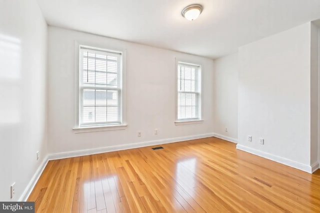 1523 N Hollywood St, Philadelphia, PA 19121 - spare room featuring hardwood / wood-style flooring and baseboards
