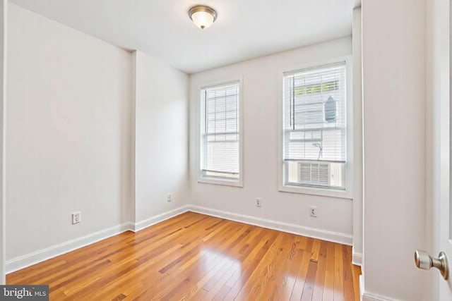 1523 N Hollywood St, Philadelphia, PA 19121 - empty room featuring baseboards and light wood finished floors