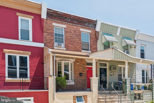 1523 N Hollywood St, Philadelphia, PA 19121 - townhome / multi-family property featuring covered porch and brick siding