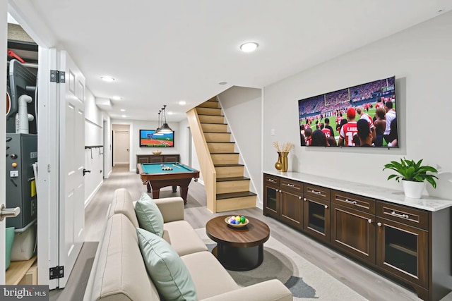1523 N Hollywood St, Philadelphia, PA 19121 - living area with billiards, light wood finished floors, stairs, and recessed lighting
