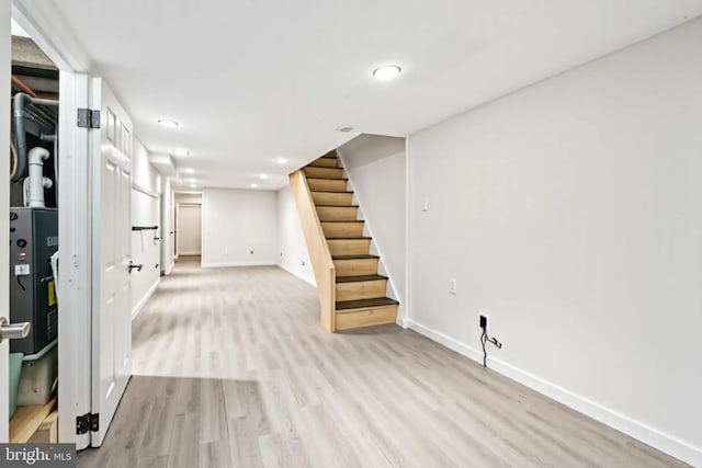 1523 N Hollywood St, Philadelphia, PA 19121 - finished basement featuring baseboards, stairs, light wood-style flooring, and recessed lighting