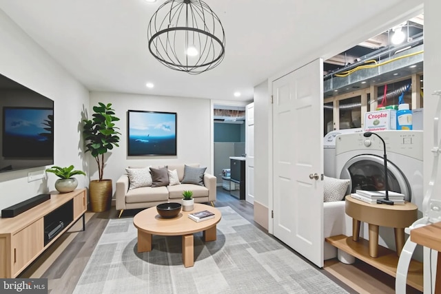 1523 N Hollywood St, Philadelphia, PA 19121 - living room with light wood-type flooring, recessed lighting, a chandelier, and washer / clothes dryer