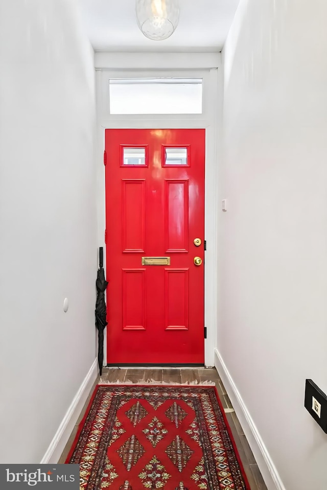 1523 N Hollywood St, Philadelphia, PA 19121 - doorway to outside with baseboards and wood finished floors