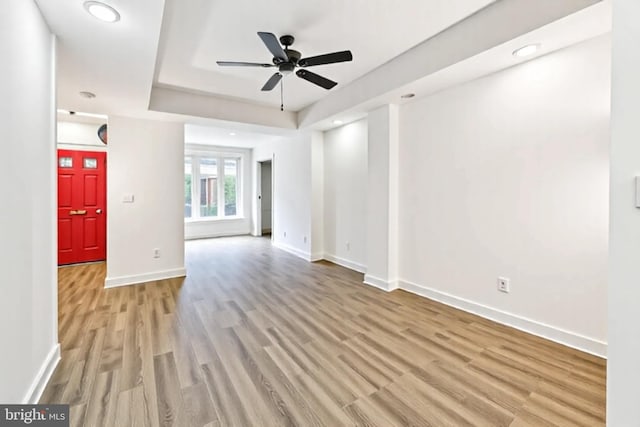 1523 N Hollywood St, Philadelphia, PA 19121 - empty room featuring a ceiling fan, light wood finished floors, baseboards, a raised ceiling, and recessed lighting