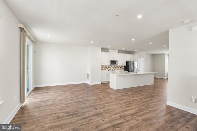 2270 Haw River Rd, Hanover, MD 21076 - unfurnished living room with wood finished floors, recessed lighting, and baseboards