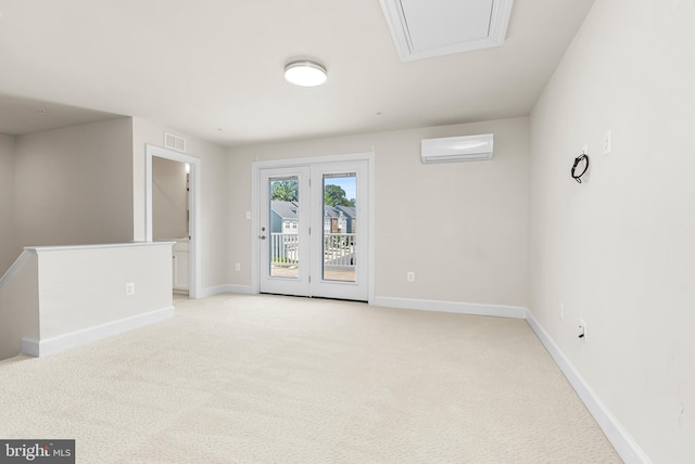 2270 Haw River Rd, Hanover, MD 21076 - spare room with light carpet, a wall unit AC, and baseboards