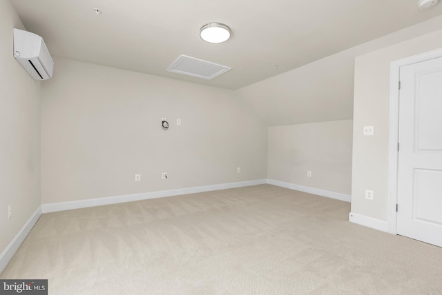 2270 Haw River Rd, Hanover, MD 21076 - additional living space with a wall mounted AC, light carpet, lofted ceiling, attic access, and baseboards