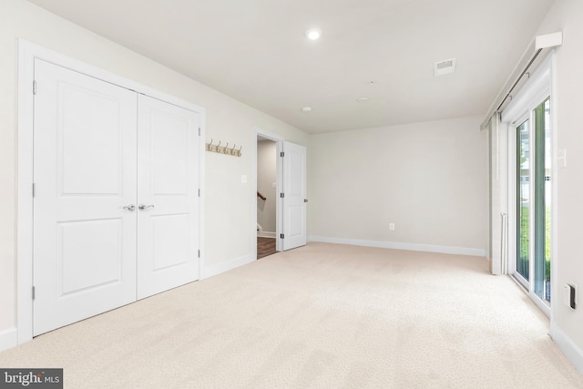 2270 Haw River Rd, Hanover, MD 21076 - unfurnished bedroom with baseboards, carpet floors, recessed lighting, and a closet