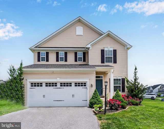 11 Kestrel Dr, Mechanicsburg, PA 17050 - traditional-style house featuring driveway, a front yard, and a garage