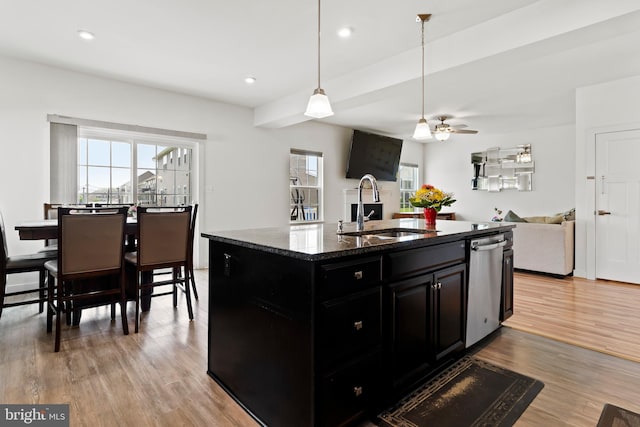11 Kestrel Dr, Mechanicsburg, PA 17050 - kitchen featuring a sink, dark cabinets, dishwasher, light wood-style flooring, and ceiling fan