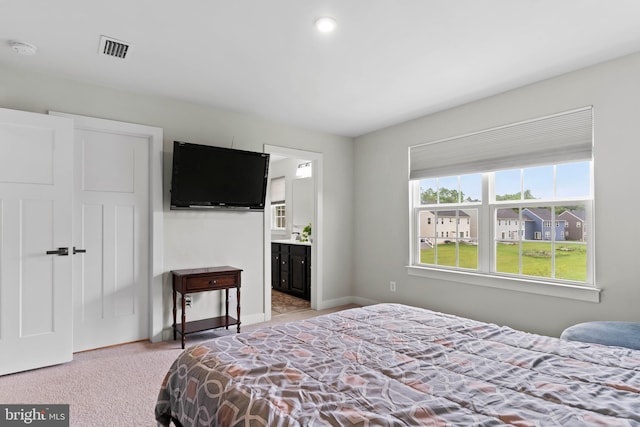 11 Kestrel Dr, Mechanicsburg, PA 17050 - bedroom featuring light colored carpet, baseboards, and connected bathroom