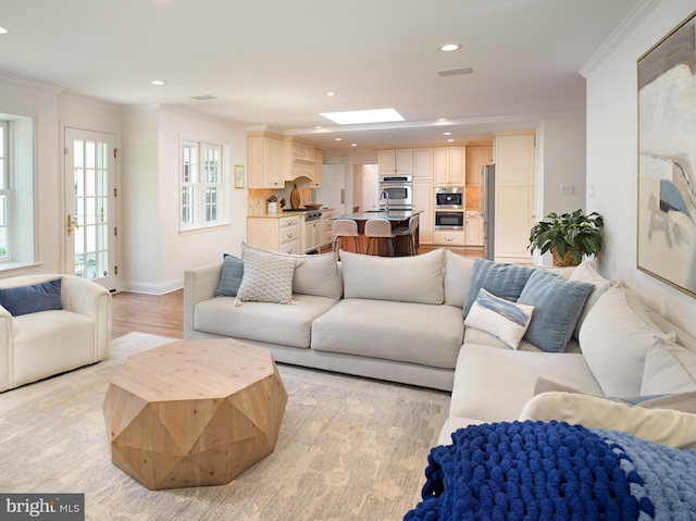 745 Conestoga Rd, Bryn Mawr, PA 19010 - living area with crown molding, recessed lighting, light wood-style floors, and baseboards
