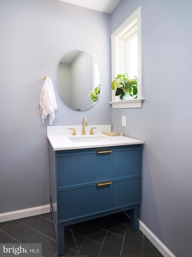 745 Conestoga Rd, Bryn Mawr, PA 19010 - bathroom with tile patterned floors, vanity, and baseboards