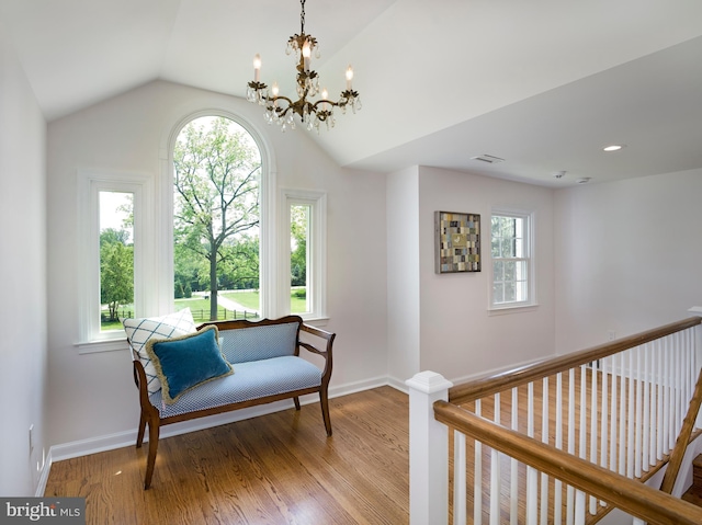 745 Conestoga Rd, Bryn Mawr, PA 19010 - living area with wood finished floors, lofted ceiling, a chandelier, and baseboards