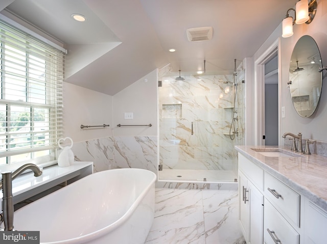 745 Conestoga Rd, Bryn Mawr, PA 19010 - bathroom with a marble finish shower, a freestanding bath, vanity, recessed lighting, and tile walls