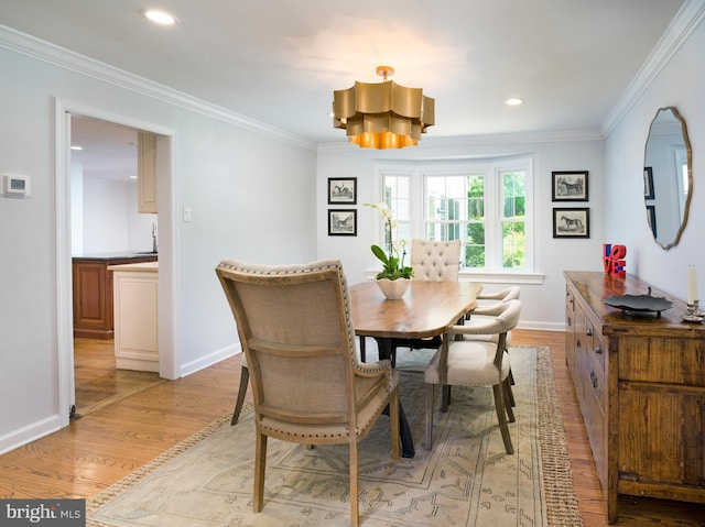745 Conestoga Rd, Bryn Mawr, PA 19010 - dining room featuring light wood finished floors, baseboards, crown molding, and recessed lighting