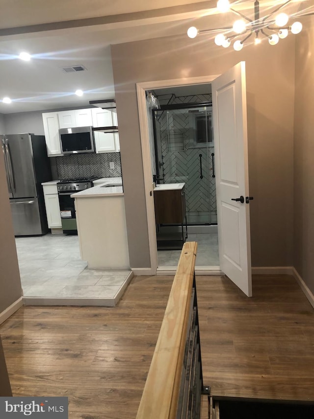 300 Darcy Ave, Hamilton, NJ 08629 - corridor with baseboards, wood finished floors, and recessed lighting