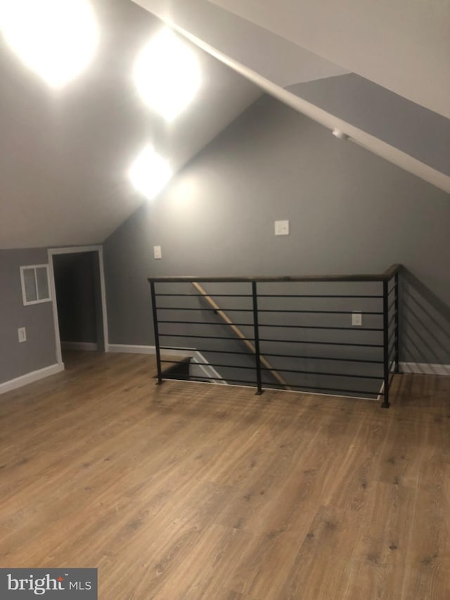 300 Darcy Ave, Hamilton, NJ 08629 - bonus room with vaulted ceiling, wood finished floors, and baseboards