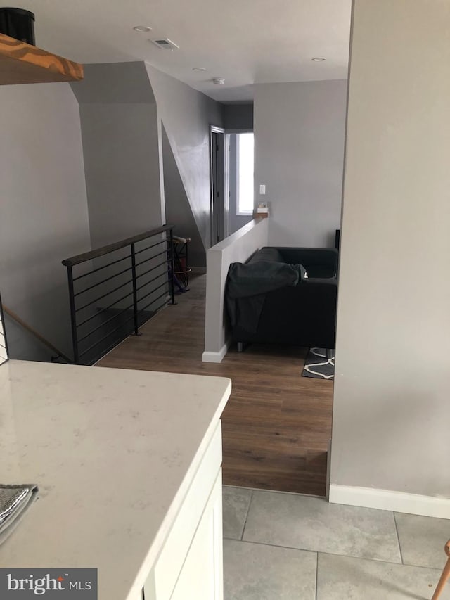 300 Darcy Ave, Hamilton, NJ 08629 - hall featuring an upstairs landing, baseboards, and tile patterned floors