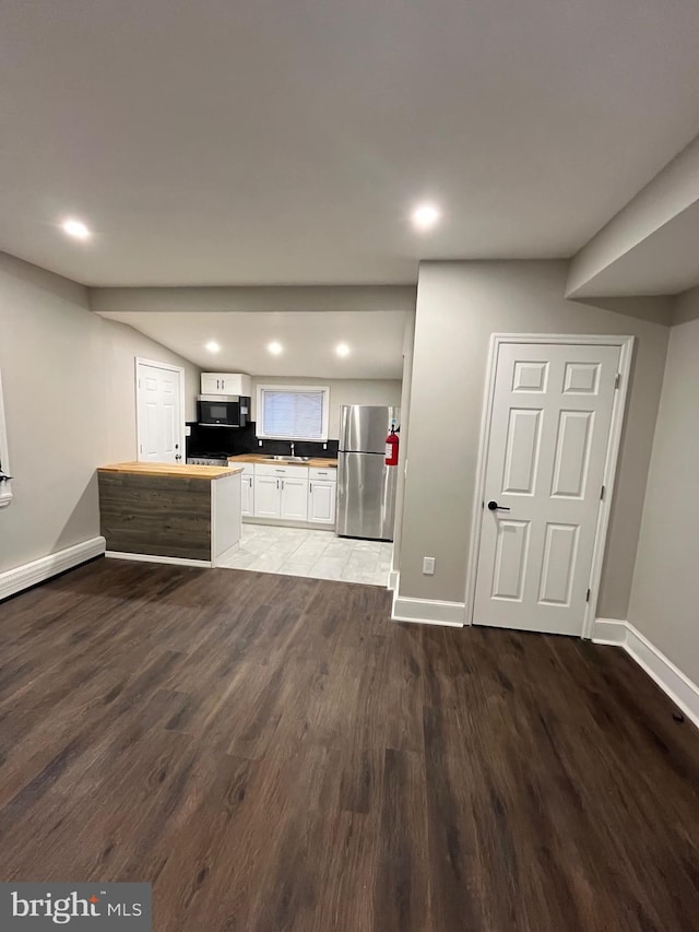 300 Darcy Ave, Hamilton, NJ 08629 - kitchen featuring freestanding refrigerator, wood finished floors, white cabinets, baseboards, and recessed lighting