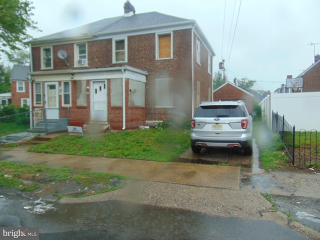 3044 N Merrimac Rd, Camden, NJ 08104 - multi unit property with brick siding, driveway, and a detached garage