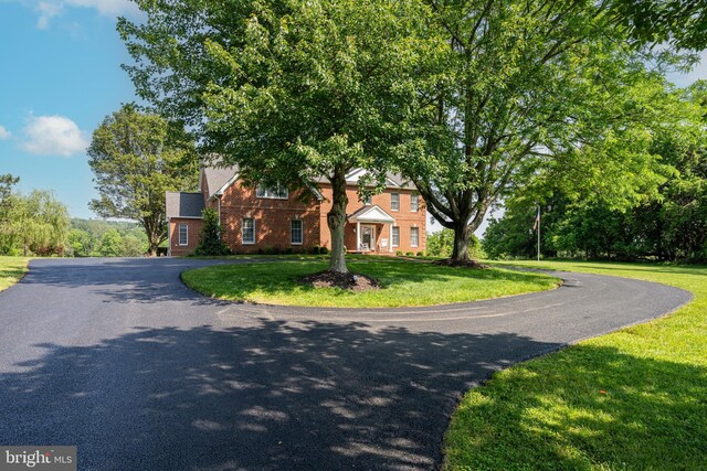 15220 Highview Ct, Waterford, VA 20197 - view of front of property featuring a front yard and curved driveway