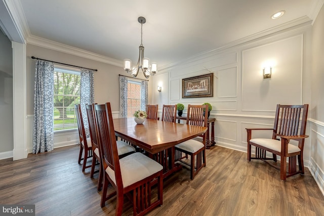15220 Highview Ct, Waterford, VA 20197 - dining space featuring a chandelier, ornamental molding, a decorative wall, dark wood finished floors, and baseboards