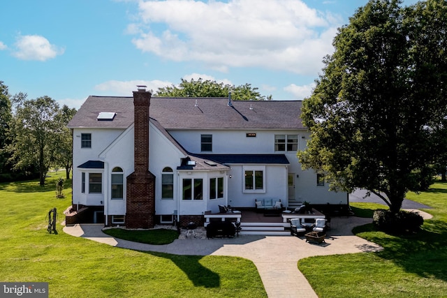 15220 Highview Ct, Waterford, VA 20197 - back of house with outdoor lounge area, a patio, a yard, stucco siding, and a chimney