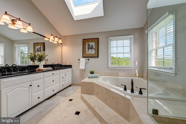 15220 Highview Ct, Waterford, VA 20197 - full bathroom featuring lofted ceiling, tile patterned flooring, healthy amount of natural light, double vanity, and a skylight