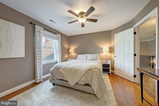 15220 Highview Ct, Waterford, VA 20197 - bedroom featuring wood finished floors, baseboards, and a ceiling fan