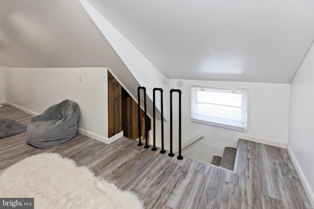 412 Horace Ave, Palmyra, NJ 08065 - stairs with wood finished floors, vaulted ceiling, and baseboards